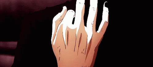 A Close Up Of A Person 'S Hand With Sharp Claws GIF
