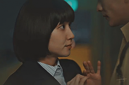 A Close Up Of A Person 'S Hand With The Letter B On The Bottom GIF