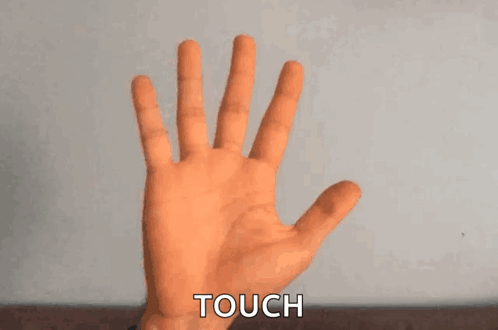 A Close Up Of A Person 'S Hand With The Word Touch Written On It GIF