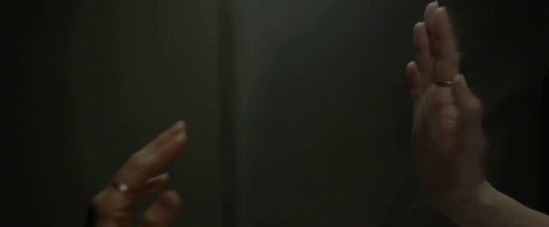 A Close Up Of A Person 'S Hands With Rings On Their Fingers GIF