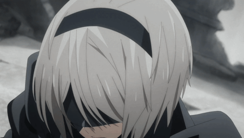 A Close Up Of A Person 'S Head With A Black Headband GIF