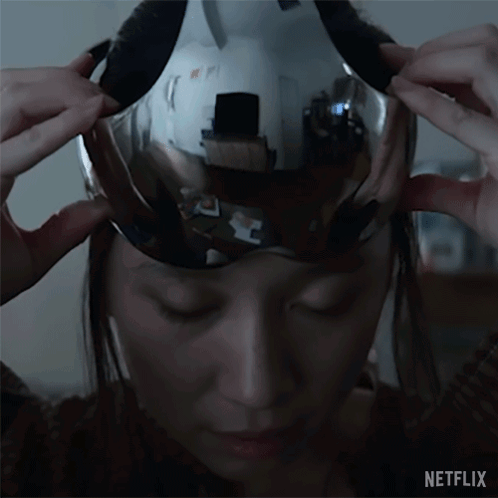 A Close Up Of A Person 'S Head With A Netflix Logo In The Corner GIF