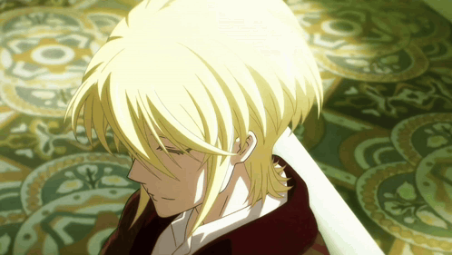 A Close Up Of A Person 'S Head With A Patterned Background GIF