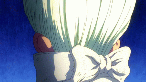A Close Up Of A Person 'S Head With A White Bow GIF