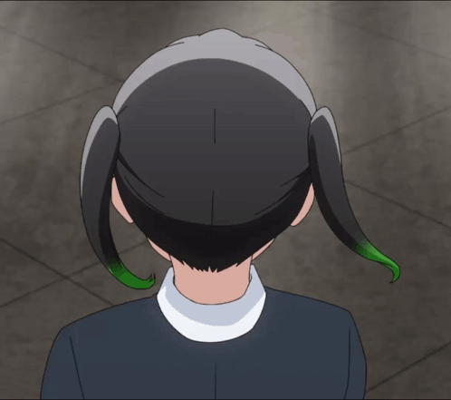 A Close Up Of A Person 'S Head With A White Collar And Green Hair GIF