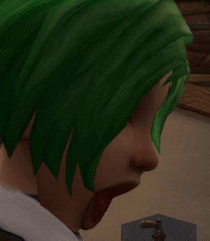 a close up of a person 's head with green hair