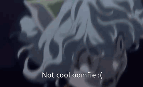 A Close Up Of A Person 'S Head With The Words `` Not Cool Oomfie '' Written On It . GIF