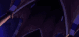 A Close Up Of A Person 'S Head With Their Hands . GIF