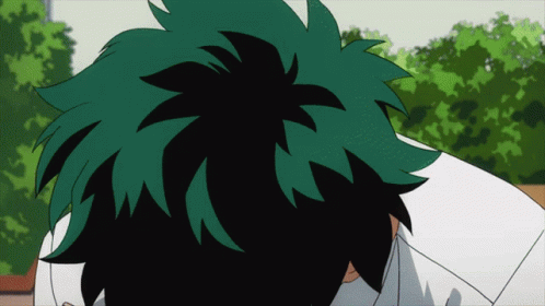 A Close Up Of A Person 'S Head With Trees In The Background GIF