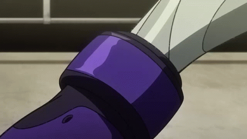 A Close Up Of A Person 'S Leg With A Purple Band Around It GIF