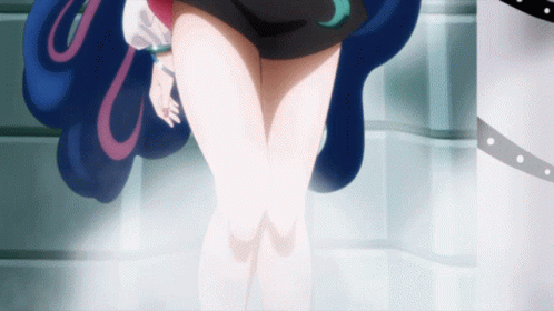 A Close Up Of A Person 'S Legs With A Glowing Light In The Background GIF