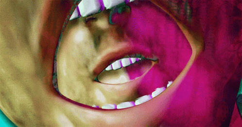 A Close Up Of A Person 'S Mouth And Teeth GIF
