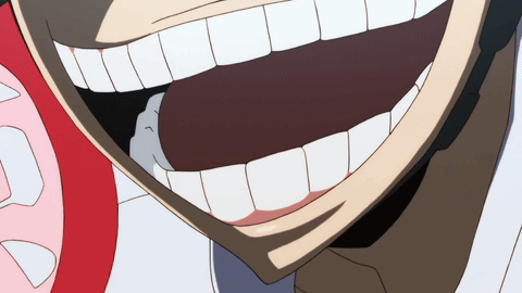 A Close Up Of A Person 'S Mouth With A Large Smile On It GIF