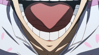 A Close Up Of A Person 'S Mouth With Their Tongue Out GIF