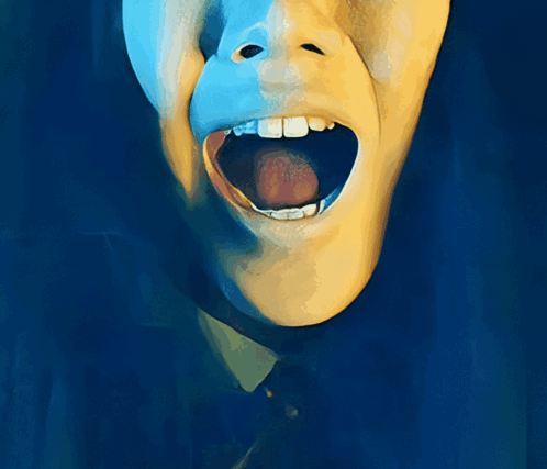 A Close Up Of A Person 'S Mouth With Their Tongue Out GIF