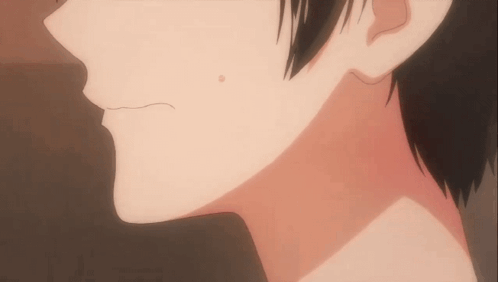 A Close Up Of A Person 'S Neck And Ear With A White Spot GIF