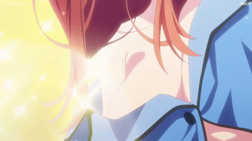 A Close Up Of A Person 'S Neck With A Yellow Light Coming Out Of It GIF