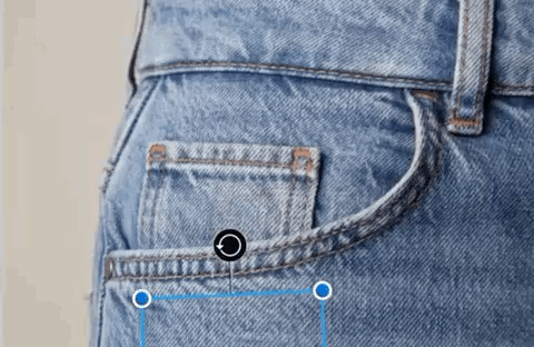 A Close Up Of A Person 'S Pocket On A Pair Of Blue Jeans . GIF