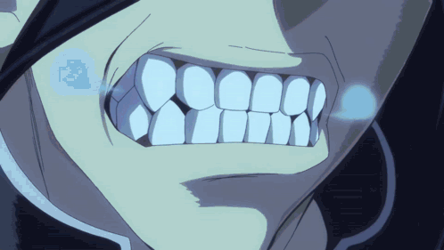 A Close Up Of A Person 'S Teeth With A Blue Light Coming Out Of It GIF