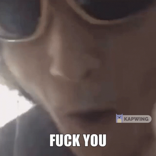 A Close Up Of A Person Screaming With The Words " Fuck You " On The Bottom GIF