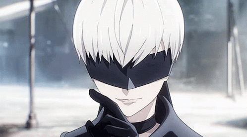 A Close Up Of A Person Wearing A Black Mask GIF