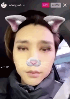 A Close Up Of A Person Wearing A Cat Ear Headband . GIF
