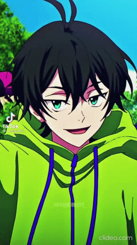 A Close Up Of A Person Wearing A Green Hoodie With A Blue Hood . GIF
