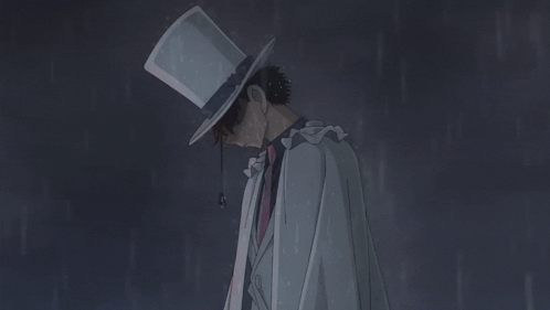 A Close Up Of A Person Wearing A Hat With A Tear Coming Out Of It GIF