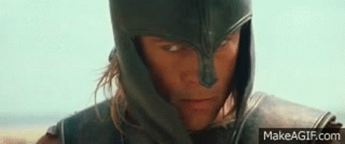 A Close Up Of A Person Wearing A Helmet And Armor . GIF