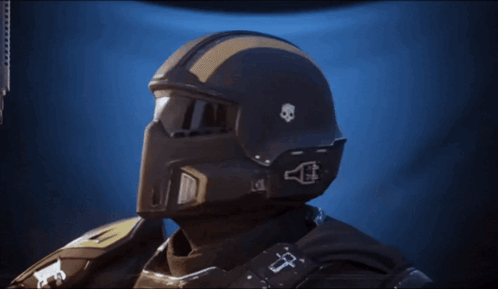 A Close Up Of A Person Wearing A Helmet And Goggles With A Cross On His Chest GIF