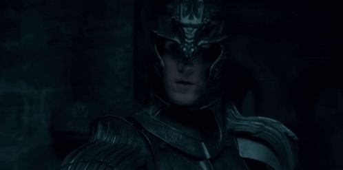 a close up of a person wearing a helmet