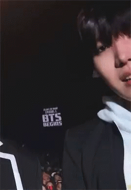 A Close Up Of A Person Wearing A Hoodie That Says Sde GIF