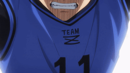 A Close Up Of A Person Wearing A Shirt That Says Team GIF