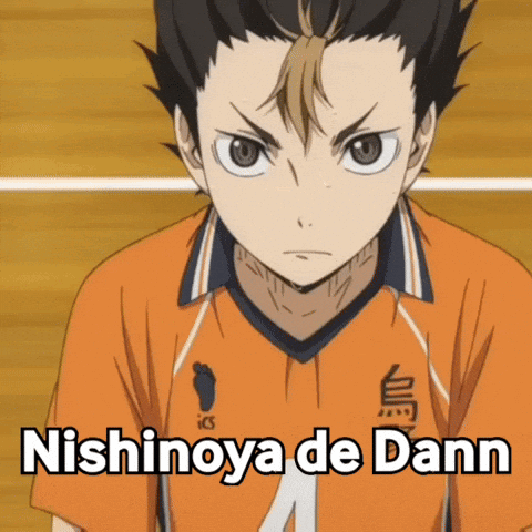 A Close Up Of A Person Wearing An Orange Shirt With The Words Nishinoya De Dann On It GIF