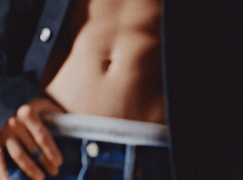 A Close Up Of A Person Wearing Calvin Klein Jeans GIF