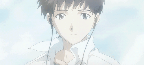 A Close Up Of A Person Wearing Earphones GIF