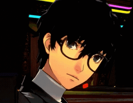 A Close Up Of A Person Wearing Glasses And A Black Suit GIF