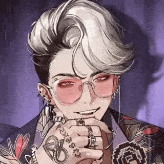 A Close Up Of A Person Wearing Glasses And A Tattoo On Their Arm . GIF
