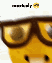A Close Up Of A Person Wearing Glasses With A Smiley Face Behind Them That Says Accactually GIF