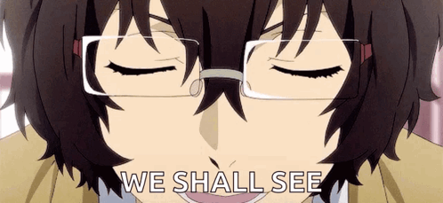 A Close Up Of A Person Wearing Glasses With The Words `` We Shall See '' Written On It . GIF