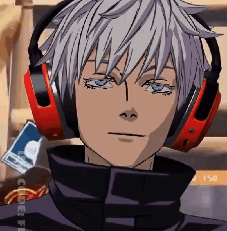 a close up of a person wearing headphones and looking at the camera .