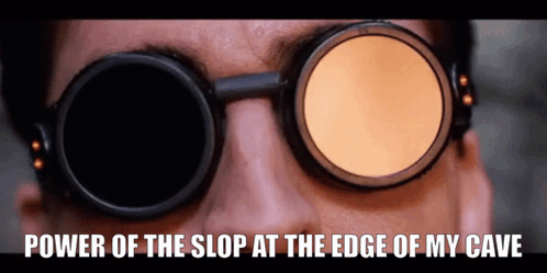 A Close Up Of A Person Wearing Sunglasses With The Words Power Of The Slop At The Edge Of My Cave Below Them GIF
