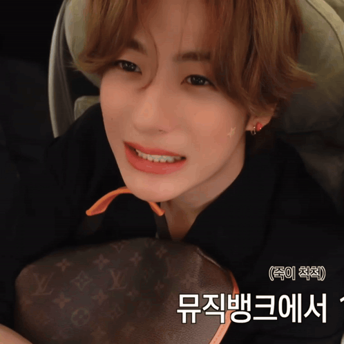 Close Up Of Person With Louis Vuitton Bag GIF