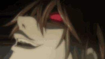 A Close Up Of A Person With A Red Eye . GIF