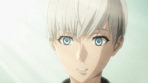A Close Up Of A Person With Blue Eyes GIF