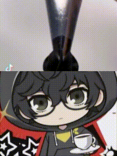 A Close Up Of A Person With Glasses And A Cup Of Coffee . GIF