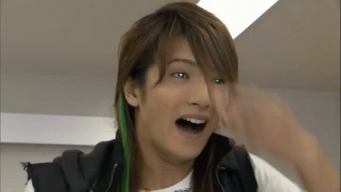 A Close Up Of A Person With Green Eyes GIF