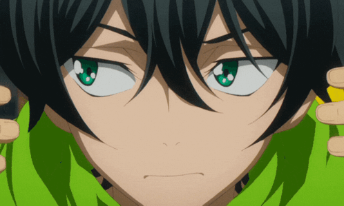 A Close Up Of A Person With Green Eyes GIF