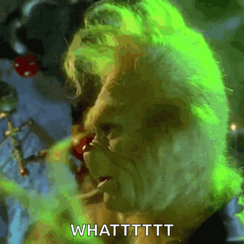 A Close Up Of A Person With Green Hair And The Words Whatttttt GIF