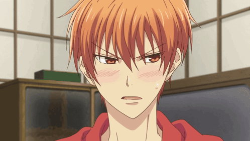 A Close Up Of A Person With Orange Hair GIF